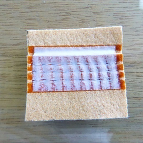 Opties voor filtertaslekkagepreventie in kolencentrales: vergelijking van het lijmcoatingproces en PTFE-tape-aanvraagproces